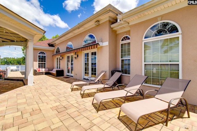 view of patio featuring french doors