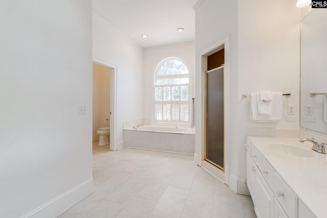 full bathroom featuring vanity, toilet, independent shower and bath, and tile patterned flooring