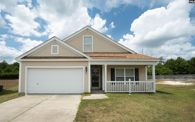 view of front of home featuring a garage, a porch, and a front yard