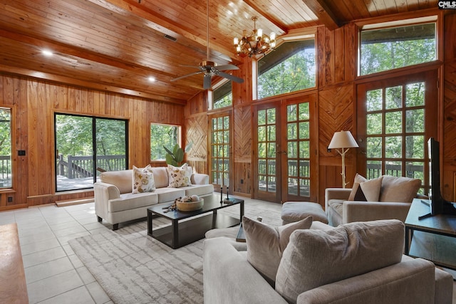 living room with wood walls, high vaulted ceiling, light tile patterned floors, beam ceiling, and wood ceiling