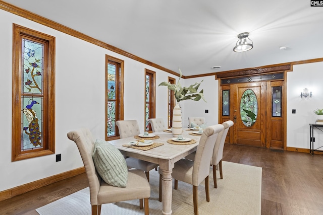 kitchen featuring light stone countertops, french doors, sink, wall chimney range hood, and appliances with stainless steel finishes