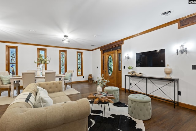 living room featuring dark hardwood / wood-style floors and ornamental molding