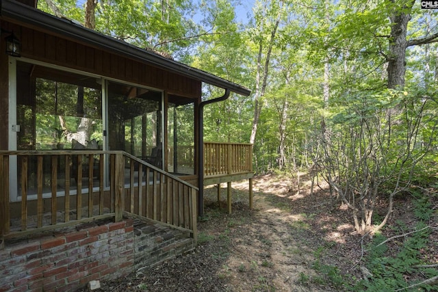 view of yard with a wooden deck