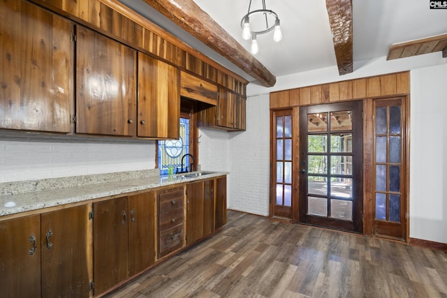 recreation room with a fireplace, wood-type flooring, and ceiling fan