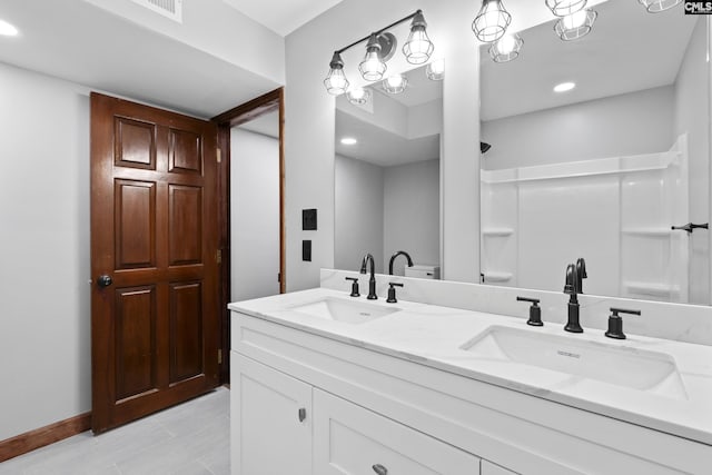 empty room featuring beamed ceiling, dark hardwood / wood-style floors, and ceiling fan