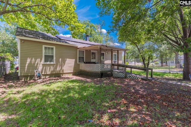 view of front of home with a deck