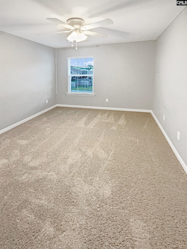 unfurnished room featuring ceiling fan