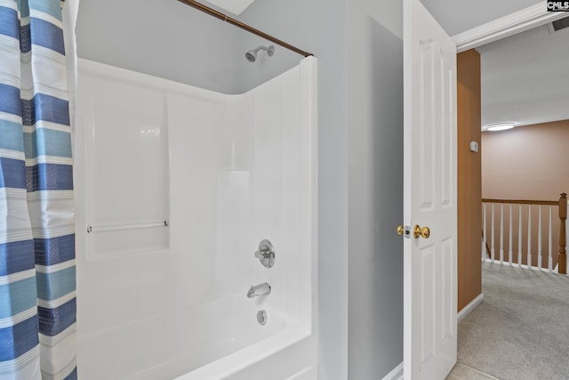 bathroom featuring shower / tub combo with curtain