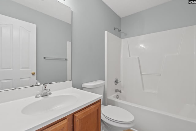 full bathroom with toilet, shower / washtub combination, and vanity