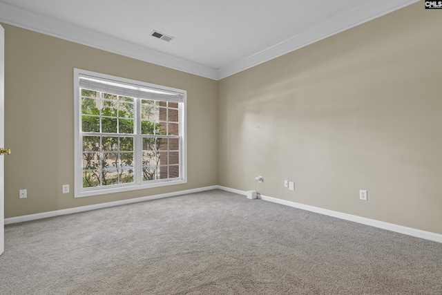 carpeted empty room with ornamental molding