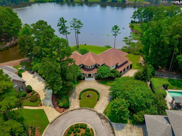 birds eye view of property with a water view