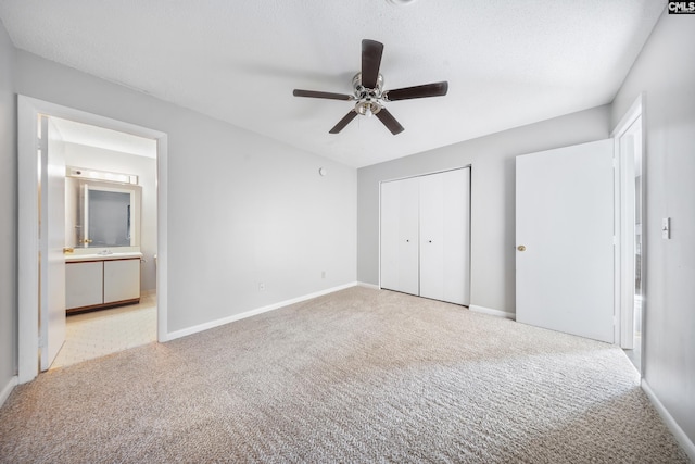 empty room with ceiling fan and carpet