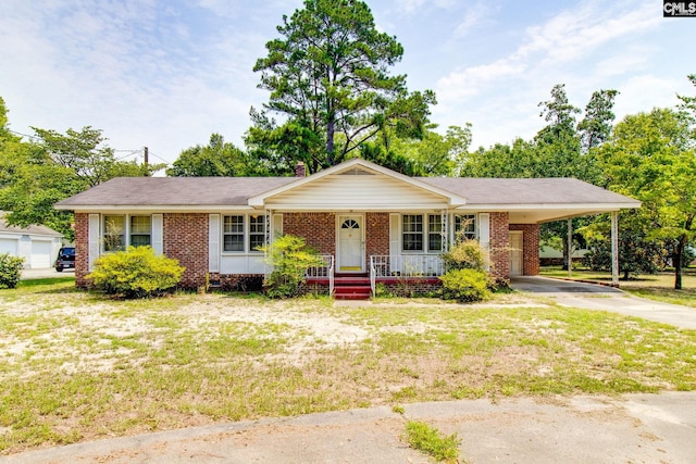 ranch-style home featuring a carport, a porch, and a garage