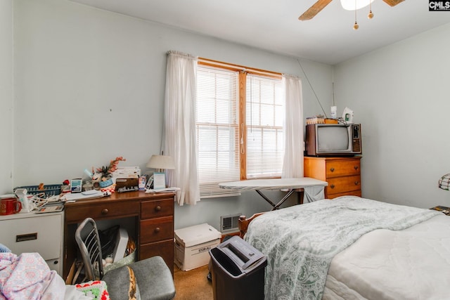 bedroom with ceiling fan and carpet flooring