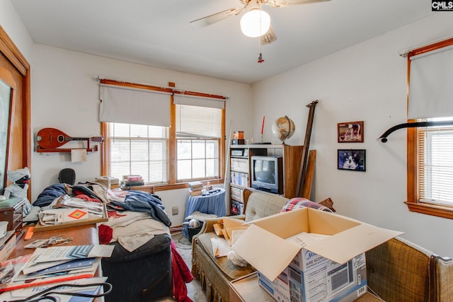 interior space featuring ceiling fan