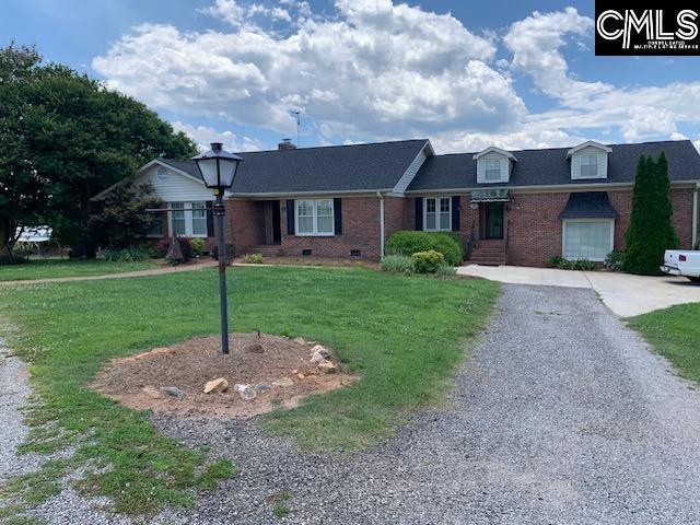 view of front of home with a front yard