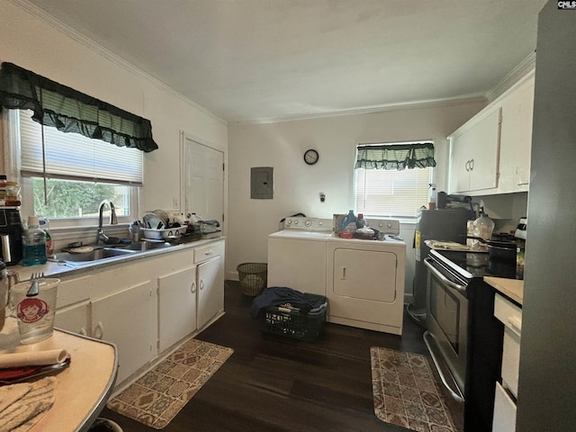 kitchen with white cabinetry, washing machine and clothes dryer, stainless steel electric stove, and sink