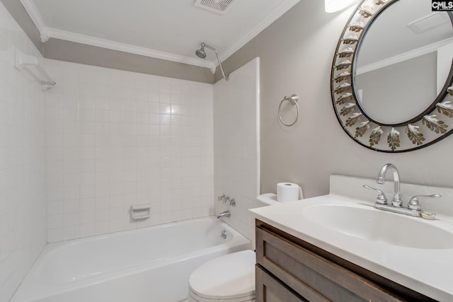 full bathroom featuring toilet, vanity, tiled shower / bath combo, and ornamental molding