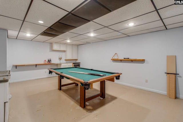 recreation room featuring a drop ceiling