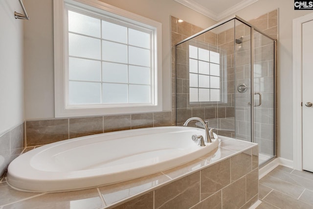 bathroom featuring crown molding, independent shower and bath, and tile patterned flooring