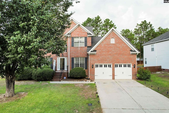 view of front of property featuring a garage and a front yard