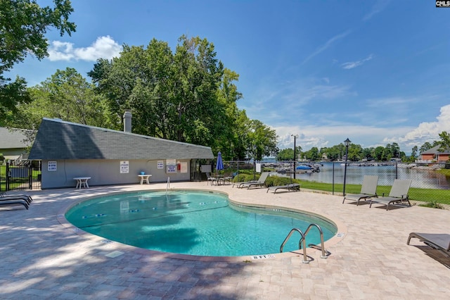 view of swimming pool featuring a patio