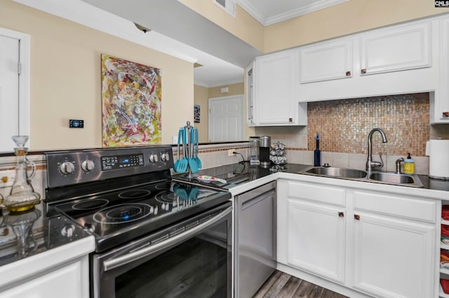 kitchen featuring white cabinetry, crown molding, tasteful backsplash, range with electric cooktop, and sink