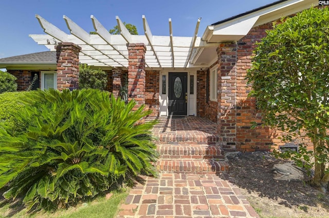 entrance to property with brick siding