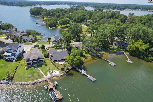 birds eye view of property featuring a water view and a residential view