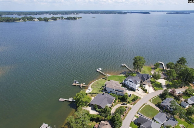 aerial view featuring a residential view and a water view