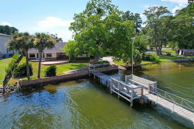 dock area featuring a water view