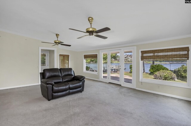 view of patio / terrace with a water view and ceiling fan