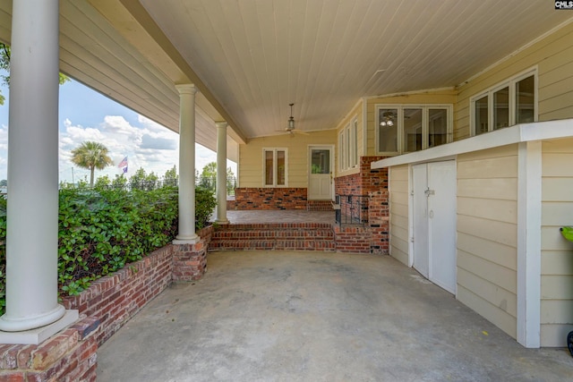 view of patio featuring ceiling fan