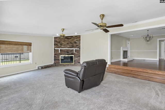 living room with ornamental molding, carpet, a fireplace, and baseboards