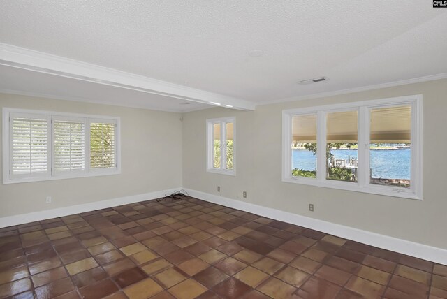 tiled spare room with sink, beam ceiling, ceiling fan, and crown molding