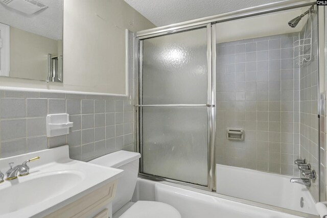 unfurnished bedroom featuring ensuite bathroom, sink, ceiling fan, and light colored carpet