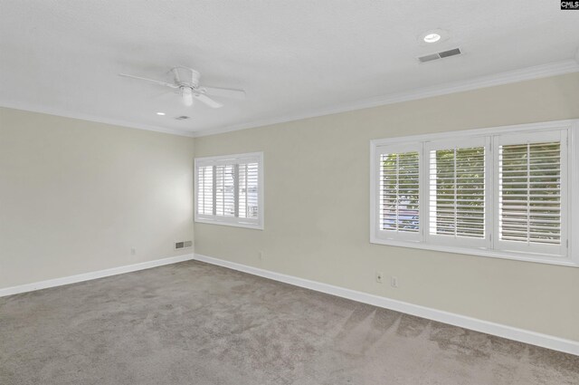 unfurnished bedroom with carpet floors, ceiling fan, and ornamental molding