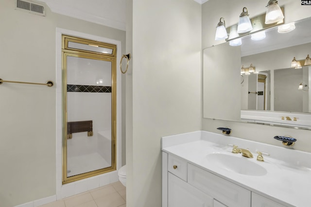 full bath with visible vents, toilet, tile patterned flooring, vanity, and a shower stall