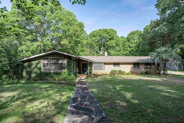 ranch-style house with a front yard