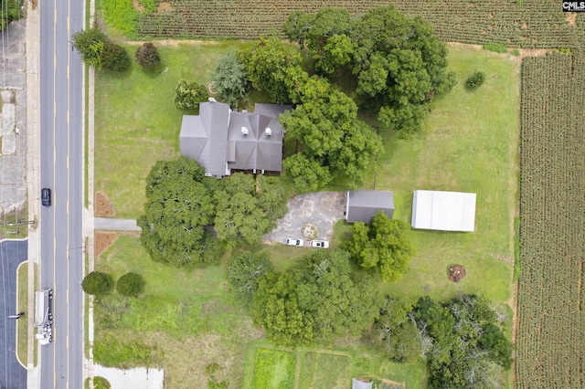 birds eye view of property featuring a rural view