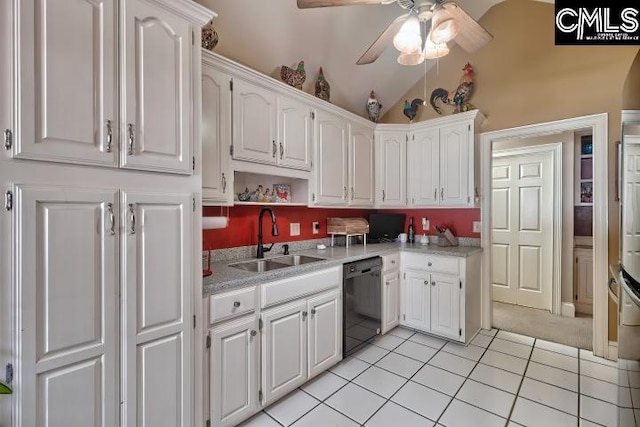 kitchen with black dishwasher, sink, light tile patterned flooring, white cabinetry, and ceiling fan