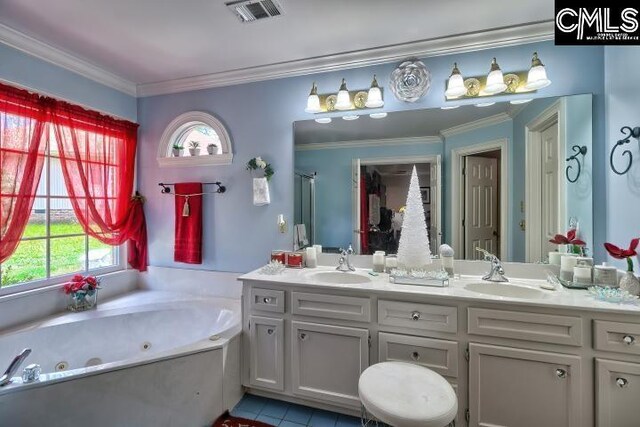 bathroom with crown molding, tile patterned flooring, a bathtub, and double sink vanity