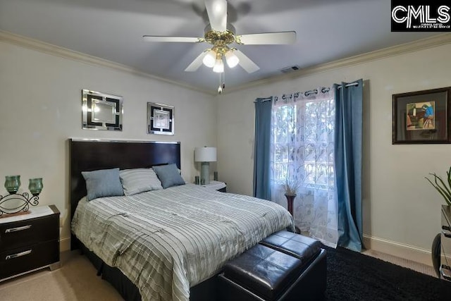 bedroom featuring light carpet, crown molding, and ceiling fan