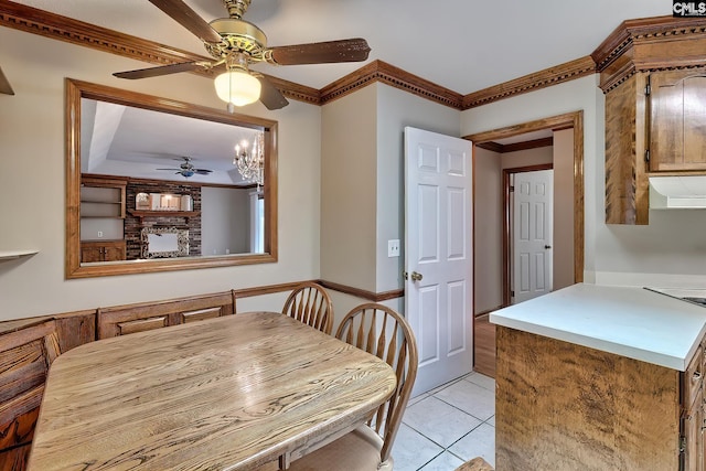 tiled dining space with ornamental molding