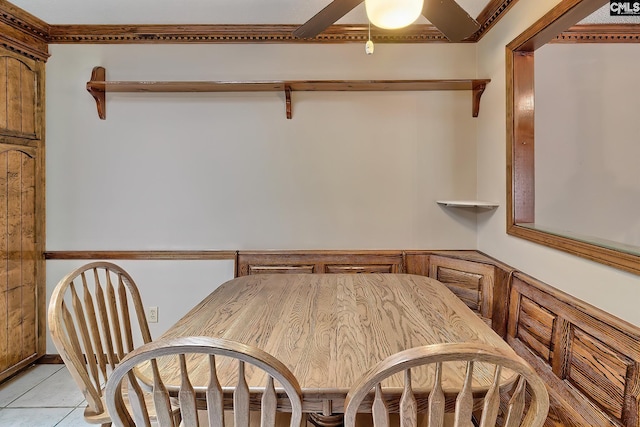 tiled dining room with ceiling fan