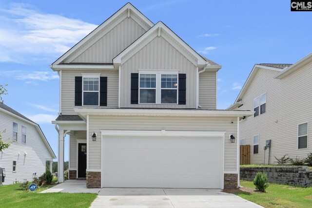 craftsman inspired home featuring a garage