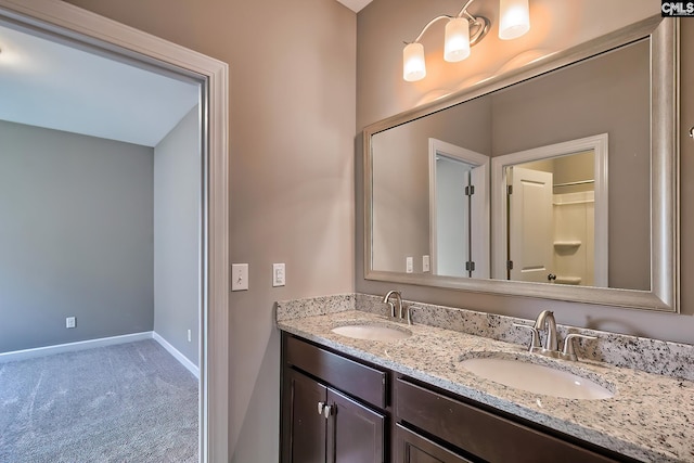 bathroom with dual vanity