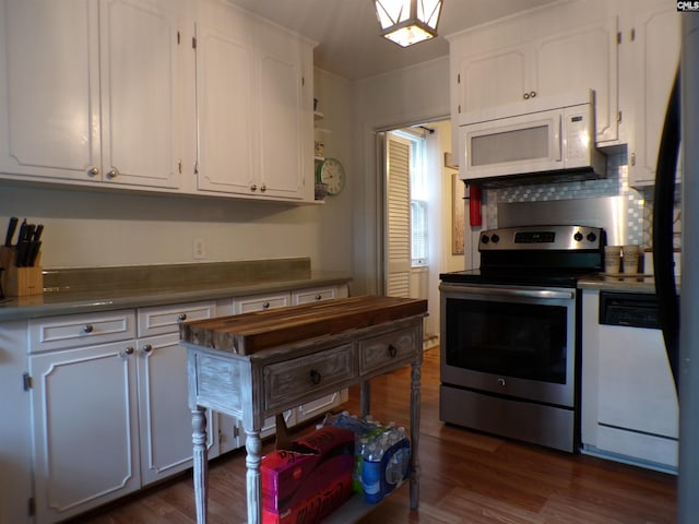 kitchen featuring white appliances, dark wood-type flooring, white cabinetry, backsplash, and ornamental molding