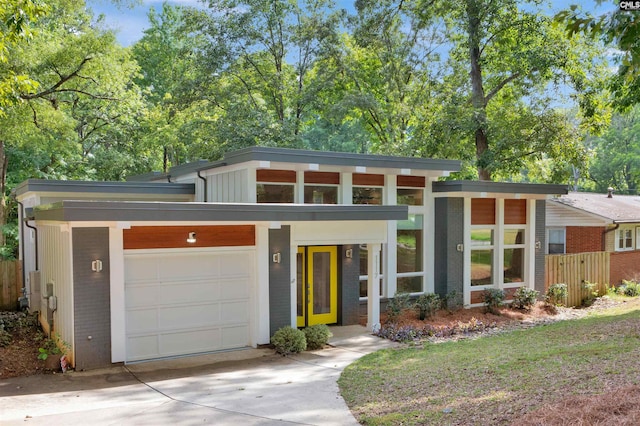 modern home featuring a garage