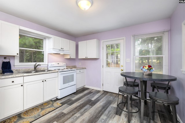 kitchen featuring sink, dark wood-type flooring, white cabinetry, electric range, and light stone countertops